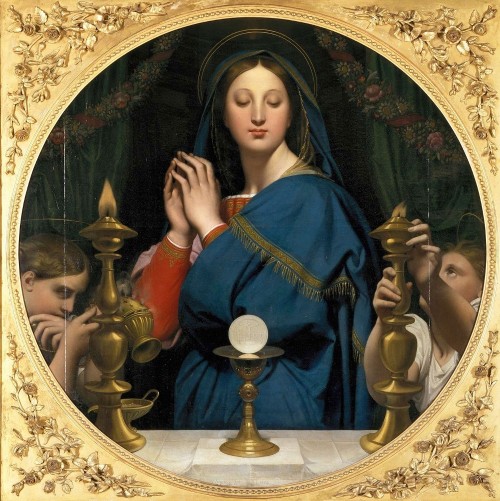 La virgen adorando la eucaristía
